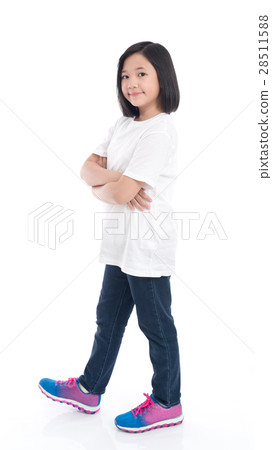Cute Asian girl in white t-shirt and jeans standin 28511588