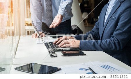 Business man working with computer in team Meeting Talking Discu 28511831