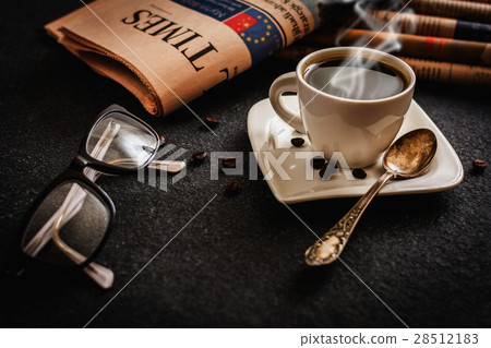 Glasses and newspaper Glasses and newspaper 28512183