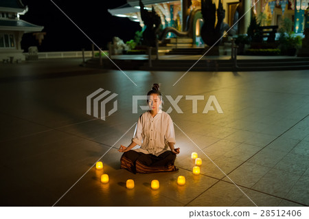 Woman meditation in temple Woman meditation in temple 28512406