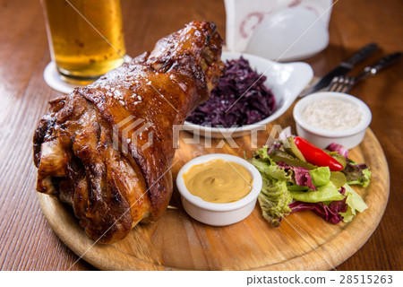 Roasted knuckle of pork with boiled cabbage Roasted knuckle of pork with boiled cabbage 28515263