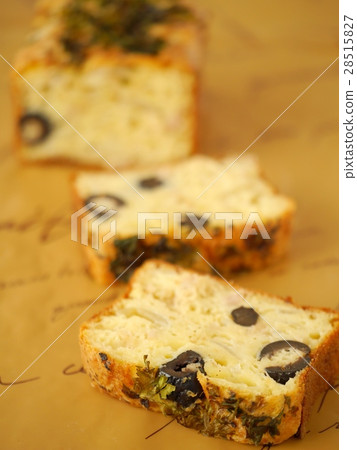 Tuna and olive cake smear cut version Brown background (vertical position) 28515827