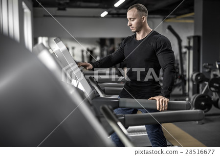 Mighty man on treadmill 28516677