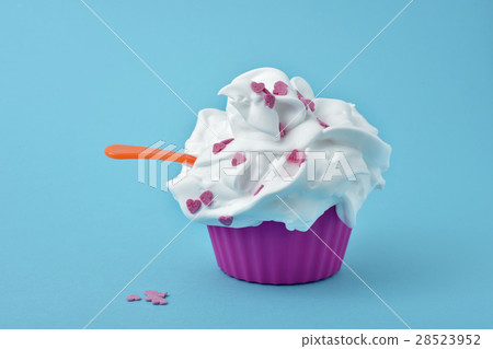 white ice cream in a pink cup 28523952