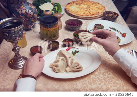 Man eating in georgian restaurant 28526645