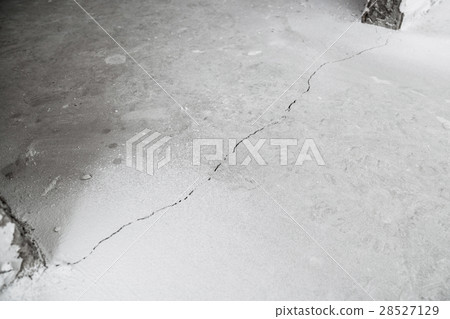 Crack in cement floor from shrinkage of house Crack in cement floor from shrinkage of house 28527129
