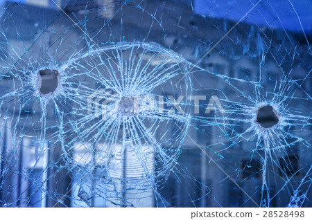 bullets pierced glass in the window 28528498