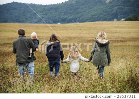 Family Walking Field Nature Togetherness Concept 28537311