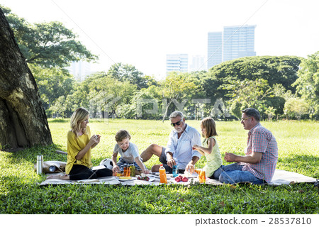 Family Picnic Outdoors Togetherness Relaxation Concept 28537810