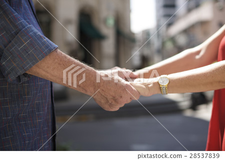 Mature people romantic holding hands 28537839