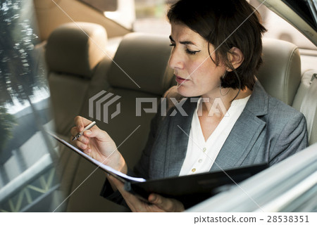 Businesswoman Busy Working Car Inside 28538351