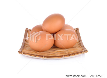 fresh raw eggs in bamboo basket and on white fresh raw eggs in bamboo basket and on white 28542519