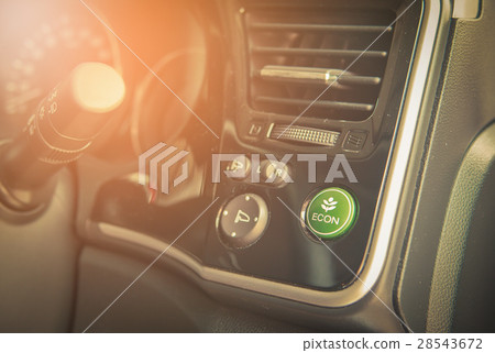 Closeup of Economic button in car. Vintage tone Closeup of Economic button in car. Vintage tone 28543672