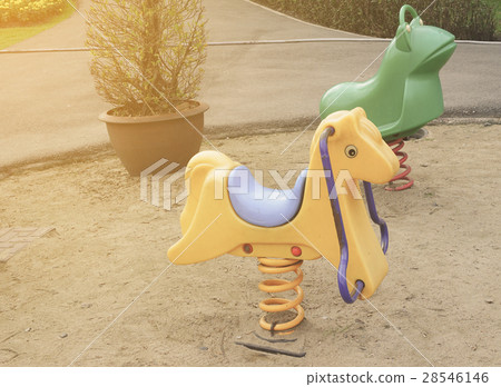 Old colorful seesaw 28546146