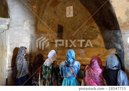 Pilgrims are near tomb in church of St. Nicholas Pilgrims are near tomb in church of St. Nicholas 28547715