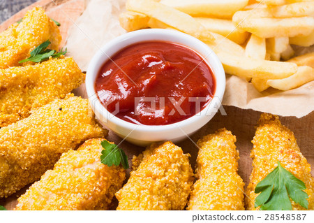 chicken strips and French fries 28548587