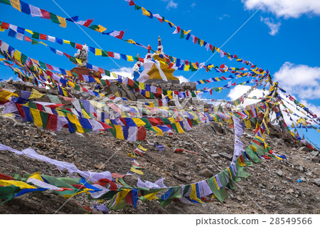 Three buddhist stupa with Buddhist prayer flags 28549566