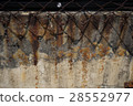 Mottled cement wall 28552977