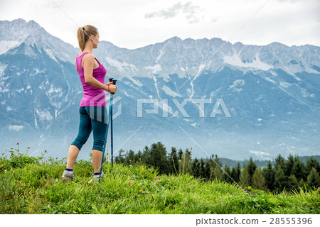 Young woman hiking in the mountains 28555396