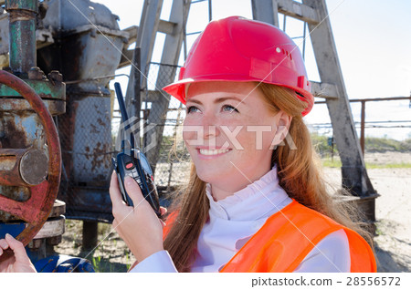 Woman in the oilfield Woman in the oilfield 28556572