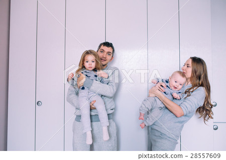 Dad, daughter, mom and little baby Dad, daughter, mom and little baby 28557609