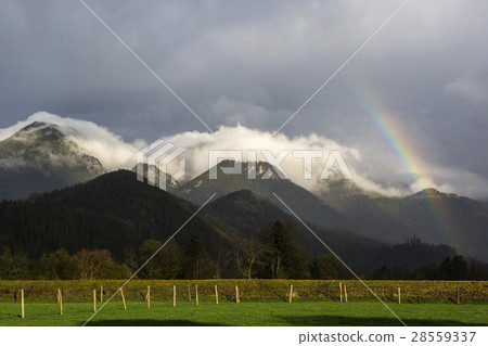 Landscape of Bavarian mountains with rainbow Landscape of Bavarian mountains with rainbow 28559337