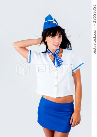 Young beautiful air hostess smiles 28559353