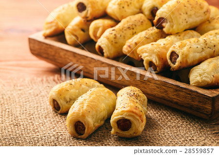 Puff pastry sausage rolls. 28559857