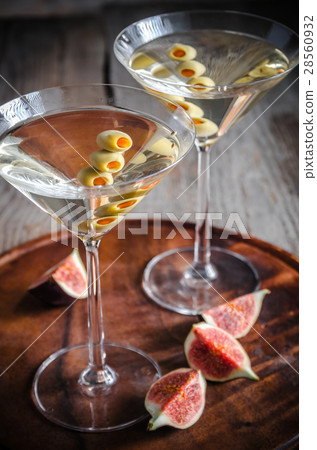 Two olive martini cocktails 28560932