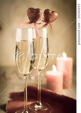 Glasses of champagne in candlelit Glasses of champagne in candlelit 28560933