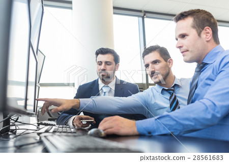 Business team working in corporate office. 28561683