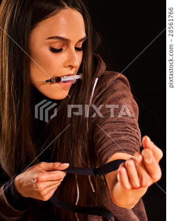 Heroin needle in addict narcotic woman's hand Heroin needle in addict narcotic woman's hand 28561766