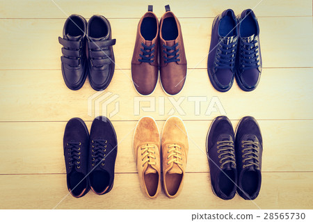 Leather shoes on wooden background Leather shoes on wooden background 28565730