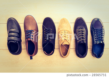 Leather shoes on wooden background Leather shoes on wooden background 28565731