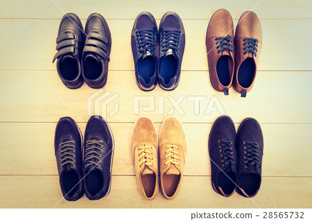 Leather shoes on wooden background Leather shoes on wooden background 28565732
