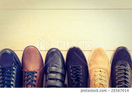 Leather shoes on wooden background 28567014