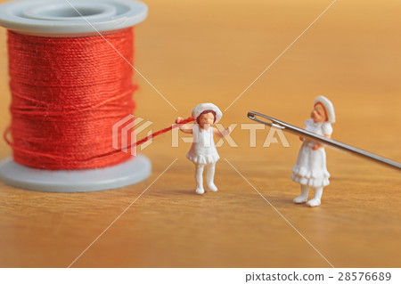 Girls and needle and thread Girls and needle and thread 28576689