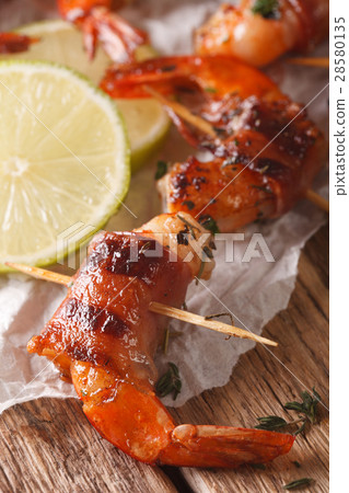 Grilled shrimp wrapped in bacon with spices 28580135