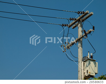 electric pole standing on the field electric pole standing on the field 28580633