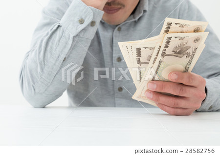 Young man with money white back Young man with money white back 28582756