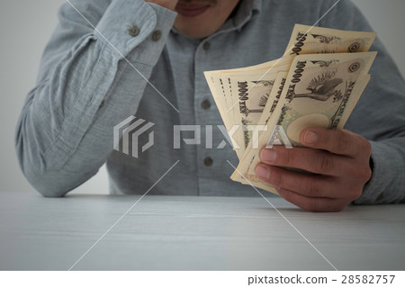 Young man with money black back Young man with money black back 28582757