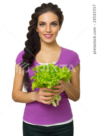 Young woman the chef prepares food Young woman the chef prepares food 28583357