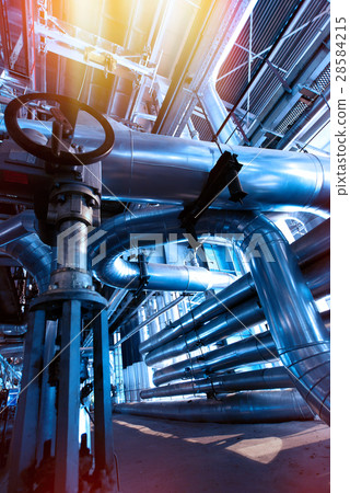 Steel pipelines and cables in blue tones 28584215
