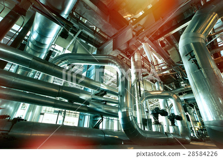 Steel pipelines and cables in green tones 28584226