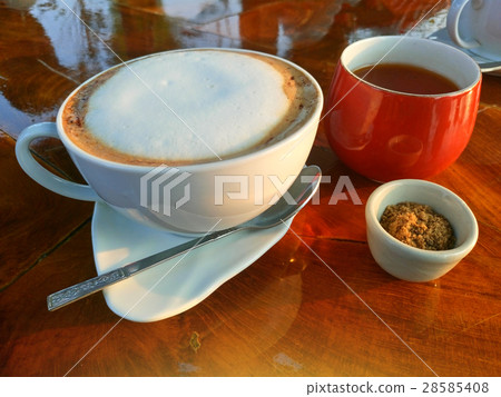 Coffee and tea white sugar on the wood table. Coffee and tea white sugar on the wood table. 28585408