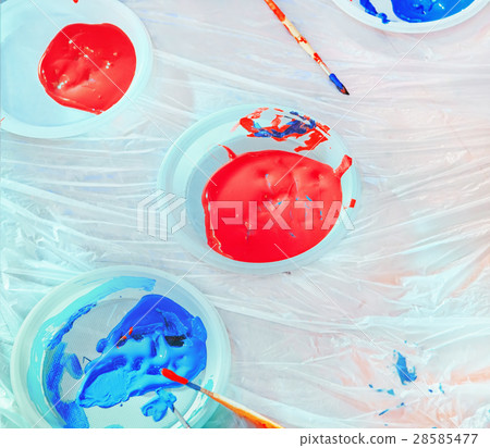 Red And Blue Paints In Plastic Plates Red And Blue Paints In Plastic Plates 28585477