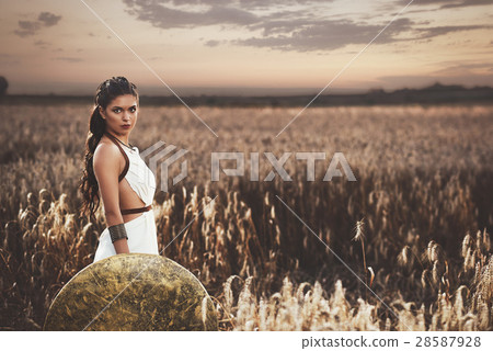 Brunette holding shield and waiting husband after 28587928