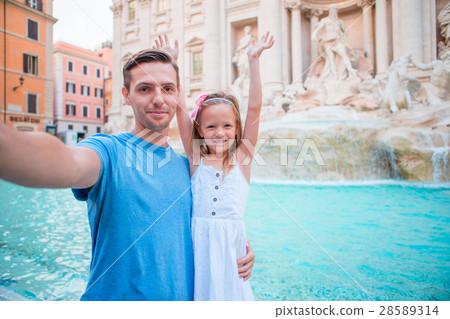 Young father and little girl making selfie Young father and little girl making selfie 28589314