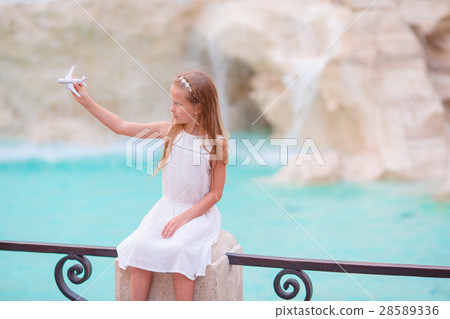 Adorable little girl with toy airplane background 28589336