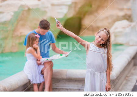 Family on Fontana di Trevi, Rome, Italy. Happy 28589355